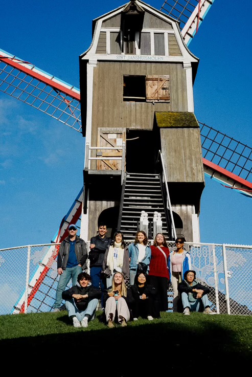 Students in front of a windmill in Brugges